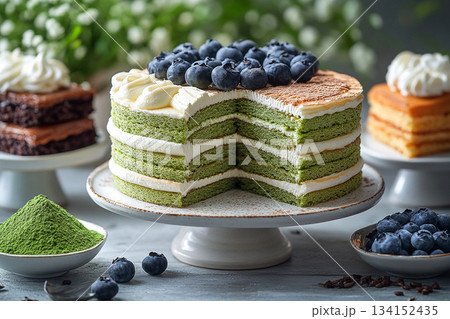 Food pairing. Japanese matcha mille crepe cake with blossoms. Asian cuisine content. Cultural and global dessert. Food pairing. Japanese matcha mille crepe cake with blossoms. Asian cuisine content. Cultural and global dessert. 134152435