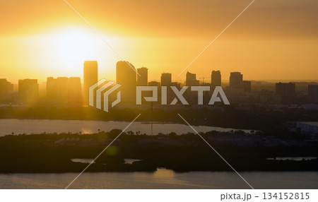 View from above of contemporary high skyscraper buildings in downtown district of Tampa city in Florida, USA at sunset. American megapolis with business financial district View from above of contemporary high skyscraper buildings in downtown district of Tampa city in Florida, USA at sunset. American megapolis with business financial district 134152815
