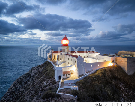 Cape Sao Vicente, Lighthouse and Atlantic Ocean in Evening Twilight. Aerial View. Algarve, Portugal 134153174