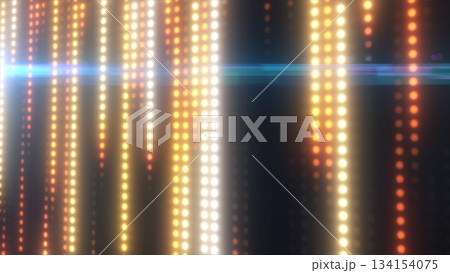 Glowing vertical rows of warm LED lights with golden and orange tones forming a vibrant illuminated abstract backdrop 134154075
