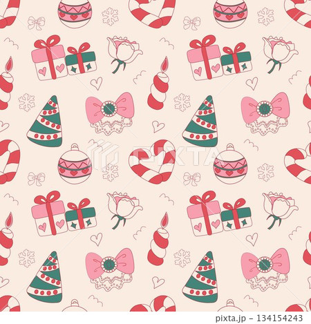 A playful flat design Christmas pattern with bows, roses, candles, candy heart, ornaments, trees, and snowflakes. Rendered in a charming palette of pink and green shades. 134154243