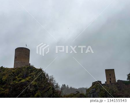 Esch-Sur-Sure, Wiltz, Grand Duche De Luxembourg, December 7, 2025, Rainsoaked hills and dramatic Esch-Sur-Sure, Wiltz, Grand Duche De Luxembourg, December 7, 2025, Rainsoaked hills and dramatic 134155543