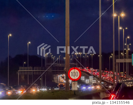 Traffic jam lights, Evening congestion with vehicle queues 134155546