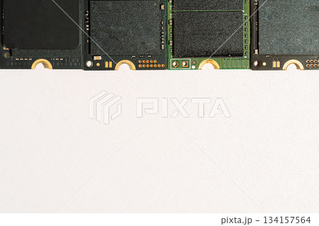 M.2 NVMe SSD modules top border on white background with copy space 134157564