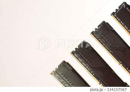 Black DDR RAM modules diagonal on white background with copy space 134157567