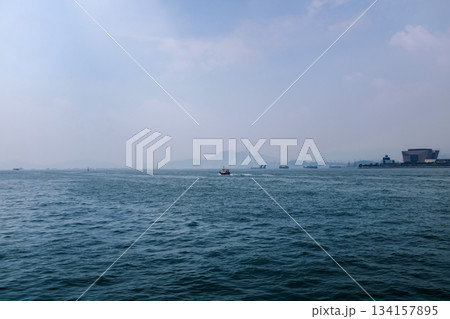 Sea view at sunset on nature concept. Beautiful sea and sky. For background, creative design graphic wallpaper. Sea view at sunset on nature concept. Beautiful sea and sky. For background, creative design graphic wallpaper. 134157895