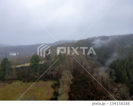 Esch-Sur-Sure, Wiltz, Grand Duche De Luxembourg, December 7, 2025, FogFilled Forest Stream Corridor 134158188