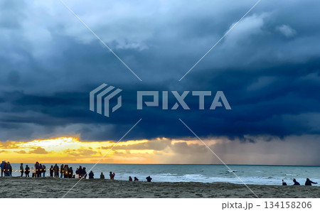 Nieuwpoort, West-Vlaanderen, Belgium, Ocotber 25th, 2025, Crowd on wet sands witnesses dramatic 134158206