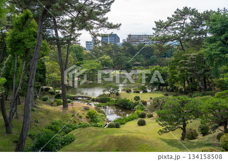 Traditional Shukkei-en Japanese garden with pond in Hiroshima, Japan 134158508