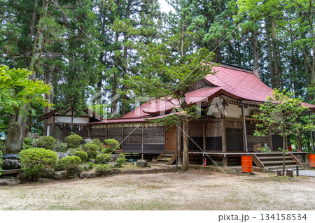 Shinmei Shrine surrounded by forest trees in Takayama, Japan 134158534