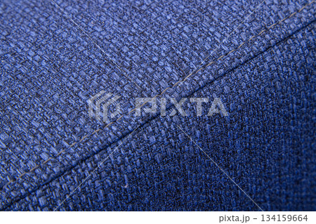 Textured blue furniture fabric with stitching 134159664