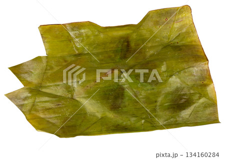 Dessert wrapped in banana leaves isolated on white background 134160284