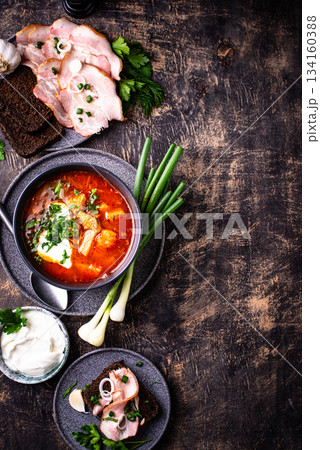 Traditional Ukrainian borsch with sour cream 134160388