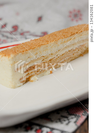 A serving of Napoleon cake or Medovik with honeycomb A serving of Napoleon cake or Medovik with honeycomb 134162081