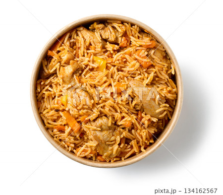 take away box of spicy rice with chicken meat and carrots 134162567