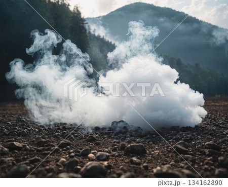 white smoke spreads across the surface of the earth 134162890