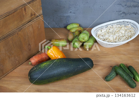 The vegetables are on the table. 134163612