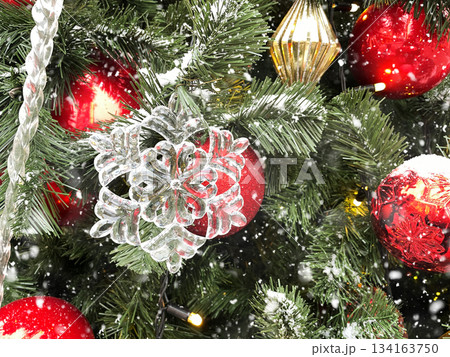Christmas tree decorated iced snowflake baubles. Xmas holiday festivities and celebrations. 134163750