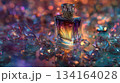 A luxurious fragrance bottle, its facets catching the glow of twinkling lights 134164028