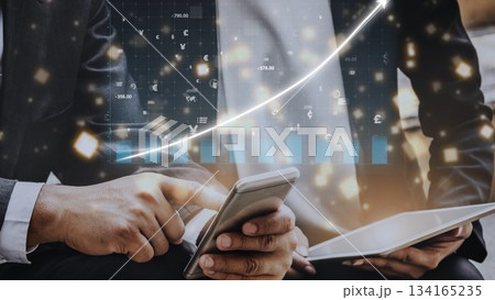 Business professional analyzing financial data on smartphone with abstract graph indicators and glowing elements in modern office environment Copula Business professional analyzing financial data on smartphone with abstract graph indicators and glowing elements in modern office environment Copula 134165235