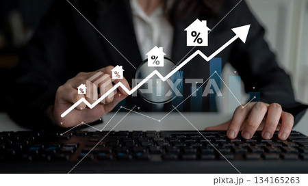 Business professional analyzing real estate market trends using magnifying glass to focus on percentage growth in investment opportunities and financial data Gantry 134165263