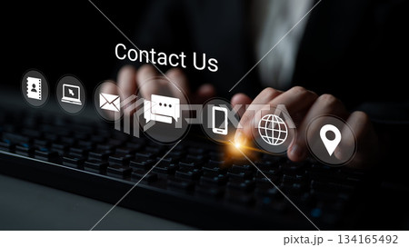 Hands Typing on Keyboard with Contact Us Icons and Dark Background for Professional Communication and Customer Service Visuals Gantry Hands Typing on Keyboard with Contact Us Icons and Dark Background for Professional Communication and Customer Service Visuals Gantry 134165492