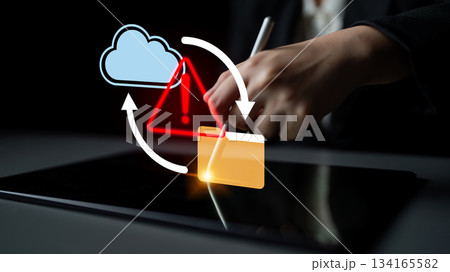 Cybersecurity Concept with Warning Symbol, Data Protection, Cloud Storage, and Digital Interaction on Tablet Device in Dark Background Gantry Cybersecurity Concept with Warning Symbol, Data Protection, Cloud Storage, and Digital Interaction on Tablet Device in Dark Background Gantry 134165582