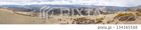 Panoramic view of Kurai Steppe with snow-covered North Chuysky Ridge in Altai Russia. Wide Siberian mountain landscape showcasing winter terrain and open plains. Panoramic view of Kurai Steppe with snow-covered North Chuysky Ridge in Altai Russia. Wide Siberian mountain landscape showcasing winter terrain and open plains. 134165588