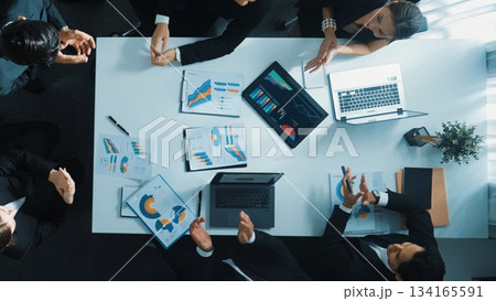 Top view of team discuss about financial plan and finding solution. Directorate. 134165591