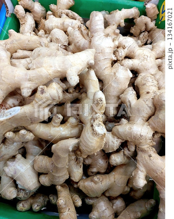 Fresh Ginger Roots for Sale at Market During Afternoon Hours in the Vibrant Setting 134167021