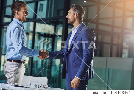 Business people, handshake and b2b success or partnership, agreement and networking in office. Corporate, men and executive shaking hands with new client, merger or collaboration on deal or job 134168464