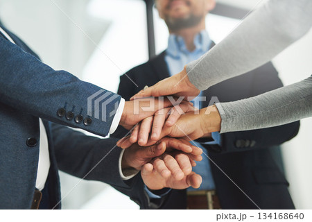Business people, hands stack and teamwork with motivation, collaboration and support for goals in workplace. Men, women and team building with solidarity for growth, staff and trust with diversity Business people, hands stack and teamwork with motivation, collaboration and support for goals in workplace. Men, women and team building with solidarity for growth, staff and trust with diversity 134168640