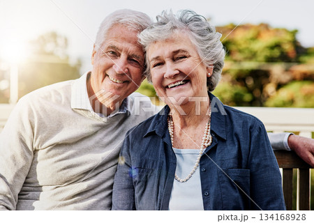 Senior couple, portrait and relaxing together outdoors or romantic retirement and park bench. Elderly, partners and affectionate faces or in love or date and feeling care or happy outside garden Senior couple, portrait and relaxing together outdoors or romantic retirement and park bench. Elderly, partners and affectionate faces or in love or date and feeling care or happy outside garden 134168928