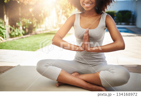 Happy woman, hands and yoga in meditation for relax, zen workout or healthy exercise on floor mat. Hand of African female yogi and smile in meditate or namaste pose for mind, body or spiritual health 134168972
