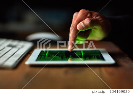 Hacker, man hands and tablet screen for software data, crack code or password and dark room in cybersecurity crime. Online, cyber thief and coding application of person hacking digital technology app 134169020