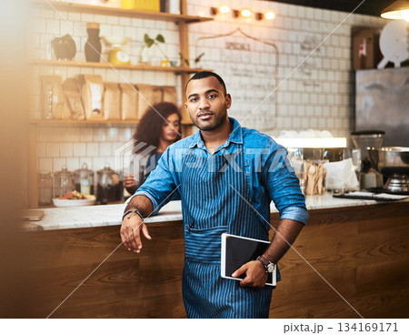 Waiter, tablet and portrait of man in coffee shop for online, entrepreneurship and startup. Retail, technology and food industry with small business owner in restaurant for barista, store and cafe 134169171