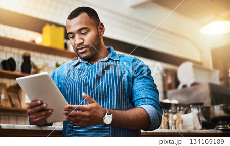 Waiter, tablet and manager with man in cafe for online, entrepreneurship and startup. Professional, technology and food industry with small business owner in restaurant for barista and coffee shop 134169189