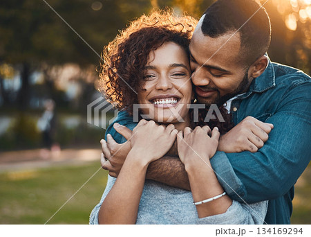 Love, hug and couple in park, smile and joy with romance, bonding and relationship with happiness. Portrait, partners or man with woman, embrace, outside or marriage with wellness, loving or carefree Love, hug and couple in park, smile and joy with romance, bonding and relationship with happiness. Portrait, partners or man with woman, embrace, outside or marriage with wellness, loving or carefree 134169294