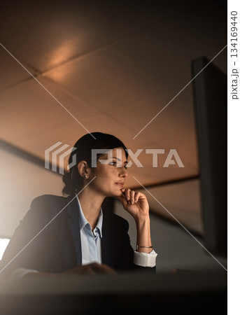 Thinking, problem solving and night research, woman in office reading email or online report at start up agency. Business, overtime and focus, businesswoman at desk working late on ideas for project. Thinking, problem solving and night research, woman in office reading email or online report at start up agency. Business, overtime and focus, businesswoman at desk working late on ideas for project. 134169440
