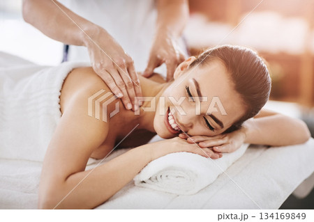 Relax, smile and massage with woman in spa for wellness, luxury and cosmetics treatment. Skincare, peace and zen with female customer and hands of therapist for physical therapy, salon and detox 134169849
