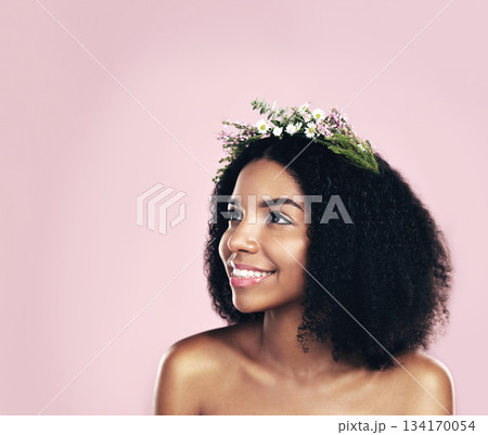 Flowers, crown and woman thinking of beauty in studio, pink background and mockup of natural afro hair care. Face, happy african model and daydream with floral wreath, spring aesthetic and eco ideas Flowers, crown and woman thinking of beauty in studio, pink background and mockup of natural afro hair care. Face, happy african model and daydream with floral wreath, spring aesthetic and eco ideas 134170054