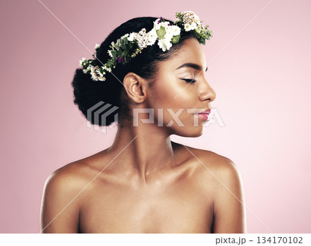Woman, flowers and hair crown for beauty in studio, pink background and natural skincare glow. African face, female model and floral headband of plants, sustainable cosmetics and eco friendly makeup Woman, flowers and hair crown for beauty in studio, pink background and natural skincare glow. African face, female model and floral headband of plants, sustainable cosmetics and eco friendly makeup 134170102