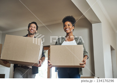 Happy couple, real estate and boxes in new home for relocation, renovation or investment together. Excited man and black woman apartment owner carrying box in house, moving in property or mortgage 134170296