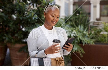 Business, smile and black woman with a smartphone, city and connection for social media, communication and chatting. Female person, girl and entrepreneur with a cellphone, mobile app and lady outside 134170580