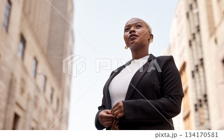 Business, employee and black woman in the city, career and confident lady travelling in town. Female person, entrepreneur and consultant in the outside, formal and professional with startup success 134170581