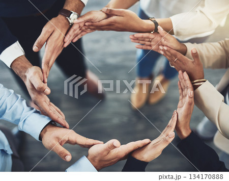 Collaboration, diversity and business people with their hands together in a circle for unity. Teamwork, friends and top view of multiracial employees with connection for team building in the office. 134170888