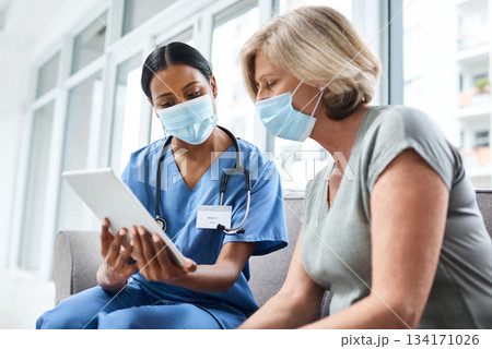 Doctor, senior woman and tablet with mask for covid consultation and digital results. Patient, nurse and tech data with a female person with communication and health insurance information at clinic 134171026