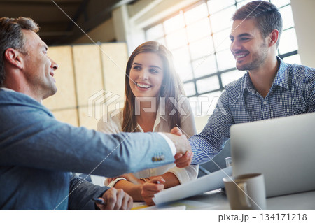 Handshake, meeting and collaboration with business people in the office, in agreement of a deal or negotiation. Teamwork, thank you and professional men shaking hands in a corporate boardroom Handshake, meeting and collaboration with business people in the office, in agreement of a deal or negotiation. Teamwork, thank you and professional men shaking hands in a corporate boardroom 134171218