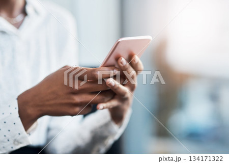 Businesswoman, typing and closeup of hands with a phone on social media, mobile app or internet. Technology, communication and cellphone for browsing or networking on online website or text message. Businesswoman, typing and closeup of hands with a phone on social media, mobile app or internet. Technology, communication and cellphone for browsing or networking on online website or text message. 134171322
