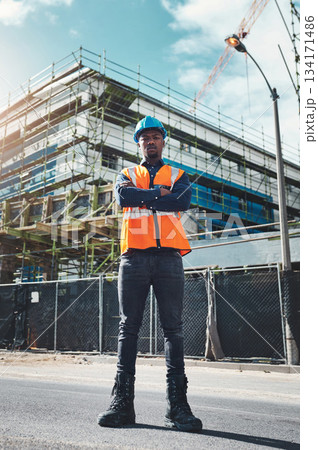Construction, engineer man and portrait at building project for development and architecture. Black male contractor serious about project management, engineering and inspection outdoor in city 134171486